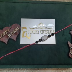 CRYSTAL RAKHI WITH Black Onyx and Howlite beads in Thread