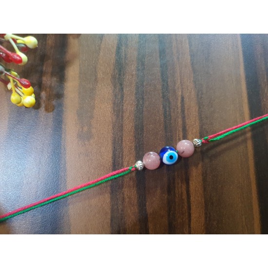 STRAWBERRY QUARTZ CRYSTAL RAKHI WITH EVIL EYE 