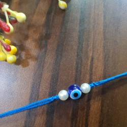 Pearl Rakhi With Evil Eye