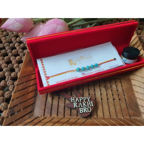 GIFT Combo Offer Turquoise CRYSTAL Rakhi And Patchouli wax perfume