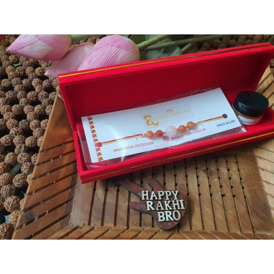 GIFT Combo Offer Carlenian and Rose Quartz CRYSTAL rakhi with Tuberose wax perfume