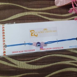 Rose Quartz crystal rakhi with evil eye