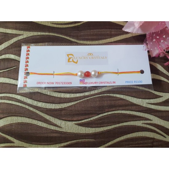 Pearl Rakhi With red Agate