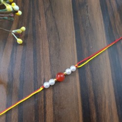 Pearl Rakhi With red Agate