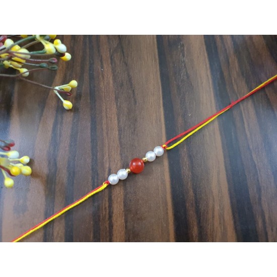 Pearl Rakhi With red Agate