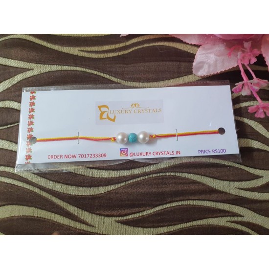 TURQUOISE CRYSTAL RAKHI WITH PEARL