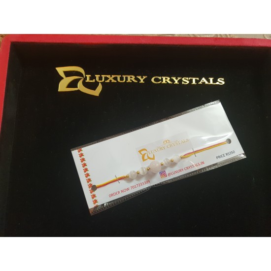 CRYSTAL Rakhi With Rose Quartz  with Selenite CRYSTAL Beads with Golden Charm Beads in Thread