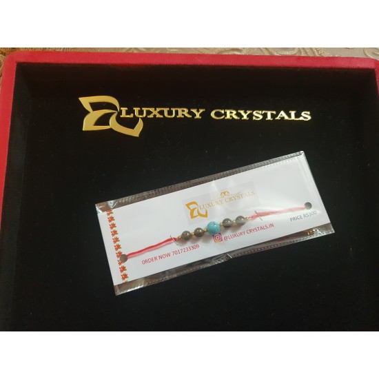 CRYSTAL Rakhi With Pyrite and Turquoise CRYSTAL Beads with Golden Charm beads in Thread