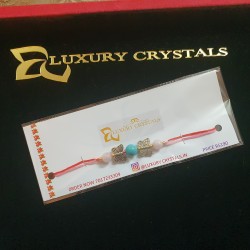 CRYSTAL Rakhi  Rose Quartz with Turquoise with Silver Charms in Thread