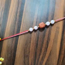 CRYSTAL Rakhi With Red Jasper with Rose Quartz CRYSTAL Beads with Golden  Charms beads in  Thread