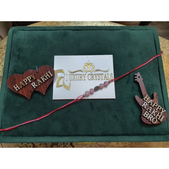 CRYSTAL Rakhi Rose Quartz with Silver Charms in Thread