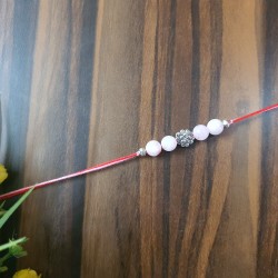 CRYSTAL Rakhi Rose Quartz with Silver Charms in Thread