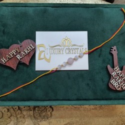 CRYSTAL Rakhi With Rose Quartz  with Selenite CRYSTAL Beads with Golden Charm Beads in Thread