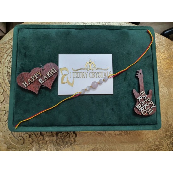 CRYSTAL Rakhi With Rose Quartz  with Selenite CRYSTAL Beads with Golden Charm Beads in Thread