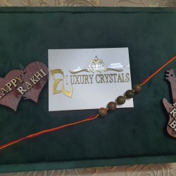 CRYSTAL Rakhi With Unakite CRYSTAL Beads with Golden Charm beads in Thread